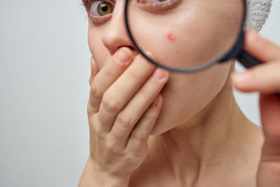 Close-up portrait of serious young woman