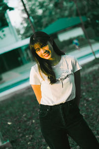 Young woman standing outdoors