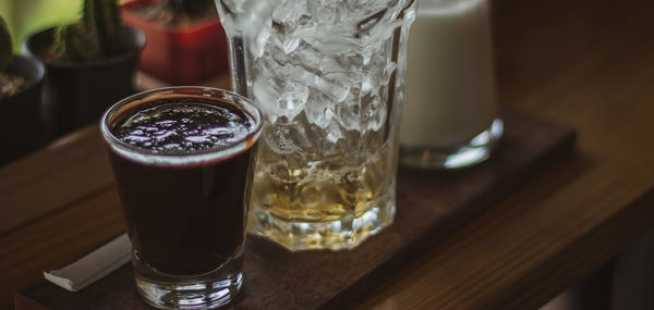 Close-up of beer glass on table
