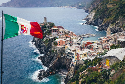 High angle view of city by sea