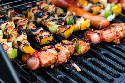 Close-up of meat on barbecue grill