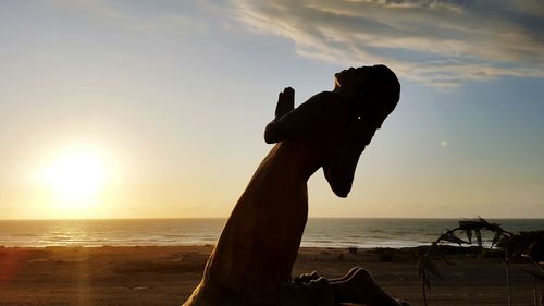 Scenic view of sea at sunset