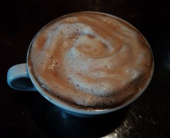 Close-up of cappuccino on table