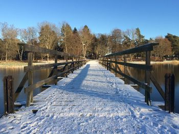 View of footbridge over wooden walkway