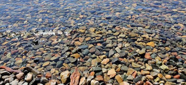 Full frame shot of pebbles on beach