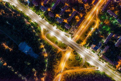 High angle view of light trails on city street