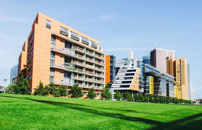 Buildings in city against sky