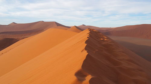 Panoramic view of desert against sky