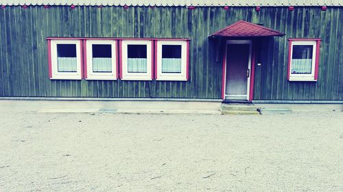 Closed door and windows of house