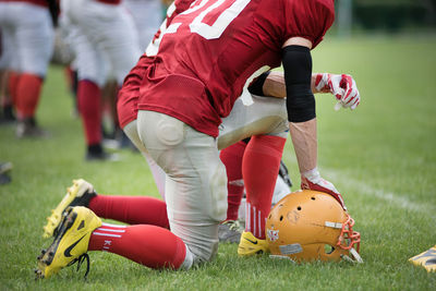 People playing with ball on field