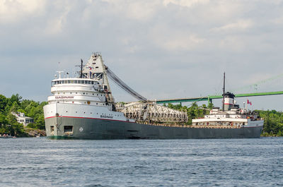 View of ship in sea against sky