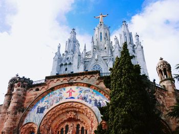 Low angle view of temple expiatori del sagrat cor against sky