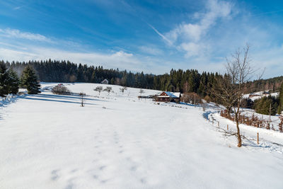 Scenic view of snow field against sky