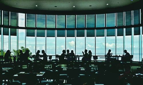 People standing in modern office building