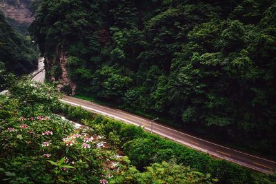 High angle view of road amidst mountains