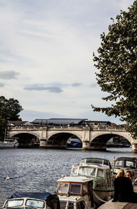 Bridge over river against sky