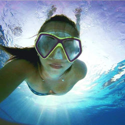 Portrait of man swimming in sea