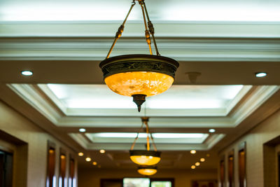 Low angle view of illuminated light bulb