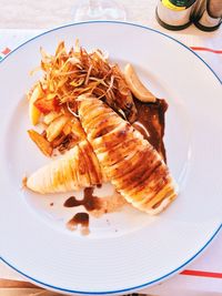 High angle view of meat in plate on table