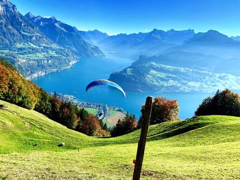 Scenic view of landscape and mountains against sky