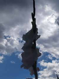 Low angle view of statue against sky