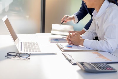 Man using laptop on table