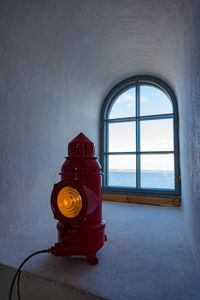 Fire hydrant on window of building