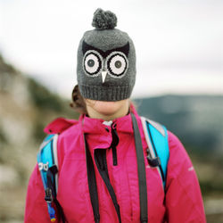 Close-up of woman wearing knit hat