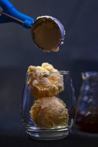 Close-up of ice cream in glass on table
