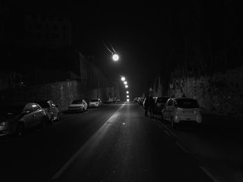 Cars on road at night