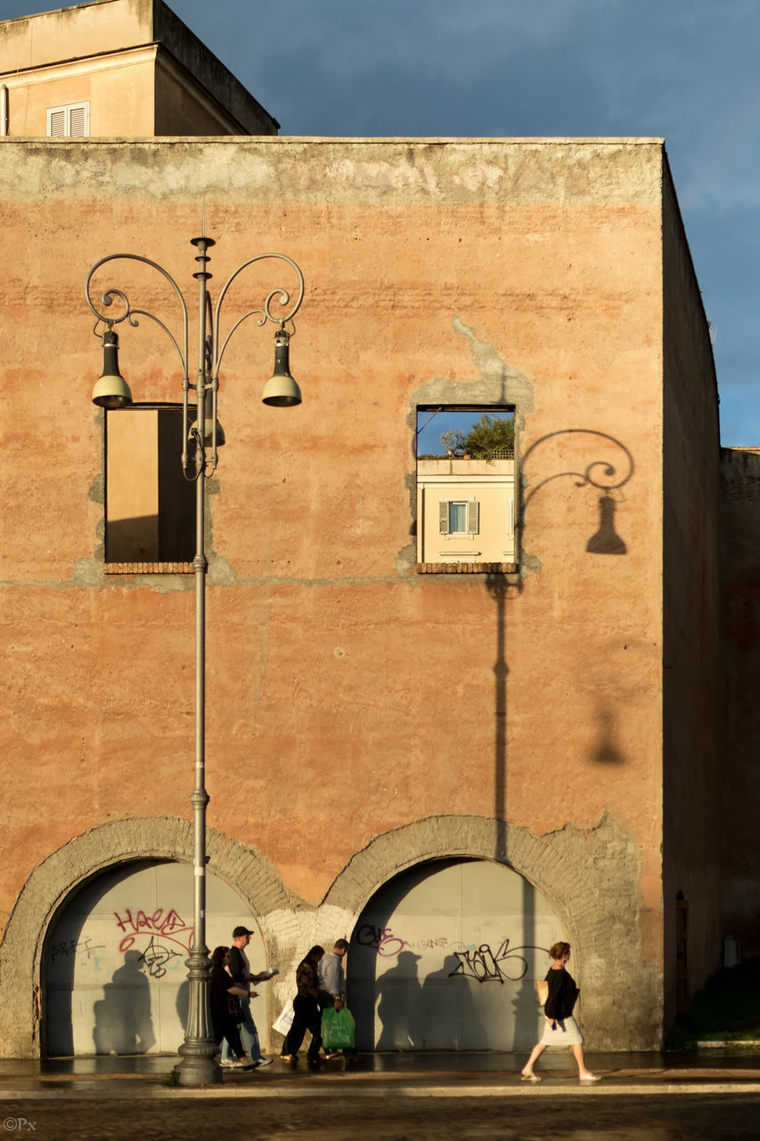 PEOPLE IN FRONT OF BUILDINGS