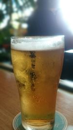 Close-up of beer on table