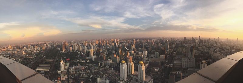 High angle view of city against sky during sunset