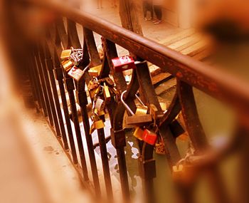 Close-up of padlocks on railing