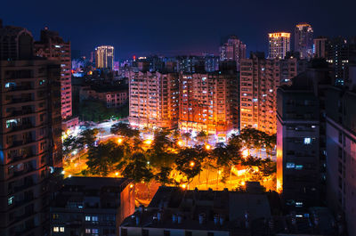 Illuminated cityscape at night