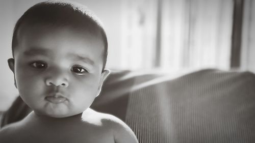 Portrait of cute baby at home