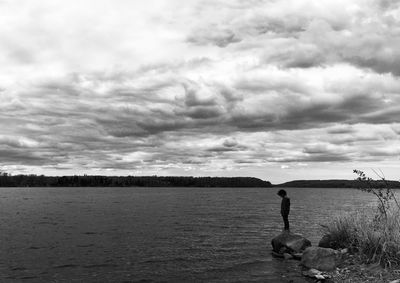 Scenic view of landscape against cloudy sky
