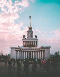 Group of people in front of building