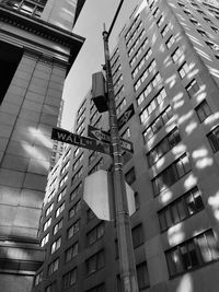 Low angle view of illuminated buildings against sky