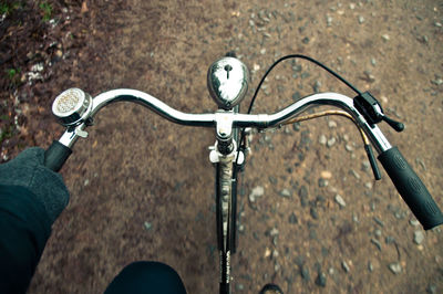 Low section of person riding bicycle