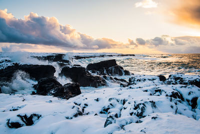 Scenic view of sea against sky during sunset