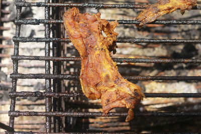 Close-up of rusty metal on barbecue grill