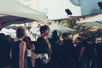 People shopping at market