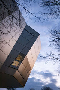 Low angle view of modern building against sky