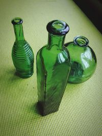 Close-up of wine bottles on table