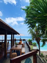 View of swimming pool at beach against sky