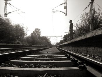 Railroad tracks against clear sky