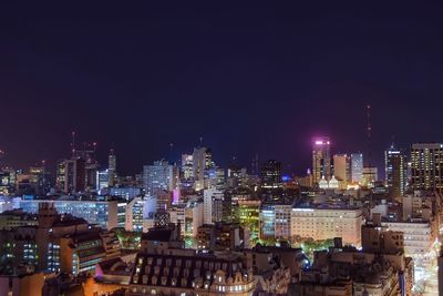 Illuminated cityscape at night