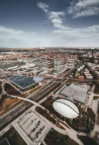 High angle view of buildings in city against sky
