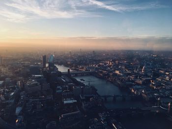 High angle view of city against sky during sunset